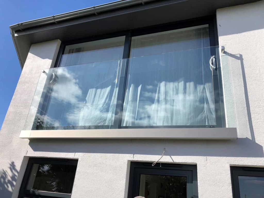 balcony with a glass balustrade on a modern home